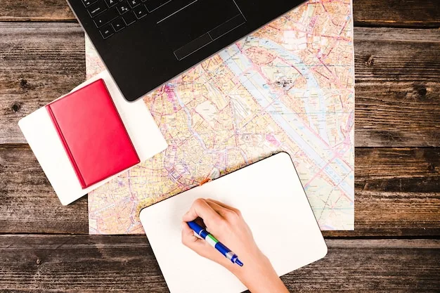 A route map and notebook laid out for kit planning